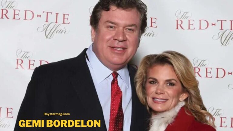 A man and a woman posing together at a formal event, standing in front of a backdrop that reads “The Red Tie Affair.” Both are dressed in formal clothing, and the woman is wearing a red coat with a fur collar. The text “GEMI BORDELON” appears at the bottom of the image. By daystarmag.com