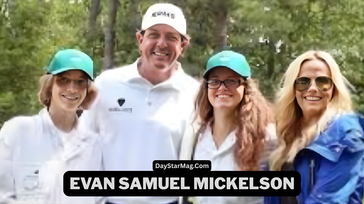 Group photo of four smiling people outdoors in a wooded area. Two individuals on the left wear white outfits and teal caps, standing beside a man in a white golf shirt and cap. On the far right is a woman with long blonde hair wearing sunglasses and a blue jacket. A black label at the bottom reads “Evan Samuel Mickelson” with “DayStarMag.com” above it.
