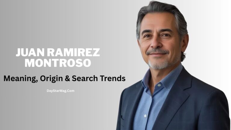 A professionally dressed man with gray hair and a trimmed beard stands against a light gray gradient background, smiling slightly. On the left, large white text reads “JUAN RAMIREZ MONTROSO,” with smaller black text below saying “Meaning, Origin & Search Trends.” The bottom text reads “DayStarMag.com.”