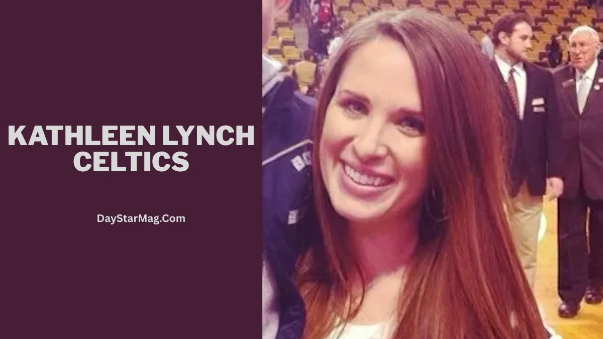 Split graphic with a dark maroon left side displaying large white text that reads “KATHLEEN LYNCH CELTICS” and smaller text “DayStarMag.com.” On the right side is a photo of a smiling woman with long brown hair standing indoors, with several people and rows of seats visible in the background.