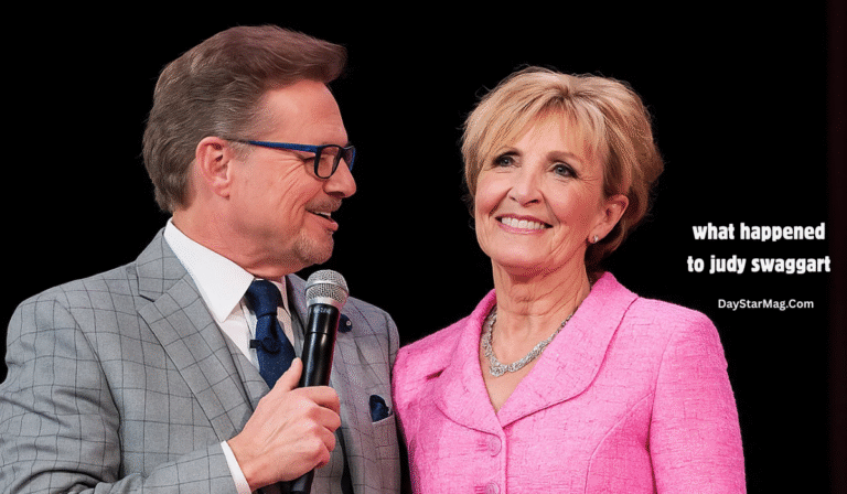 “An older man in a gray suit holds a microphone while smiling and looking at an older woman in a pink blazer who is also smiling. White text on the right side reads, ‘what happened to judy swaggart’ and ‘DayStarMag.com.’”