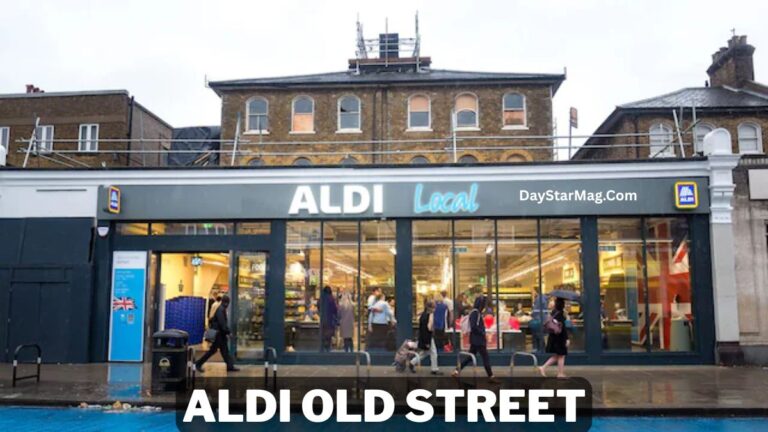 Exterior view of an ALDI Local supermarket on a rainy day, with people walking past the storefront and the building’s large glass windows showing shoppers inside. Text at the bottom reads “ALDI Old Street.”